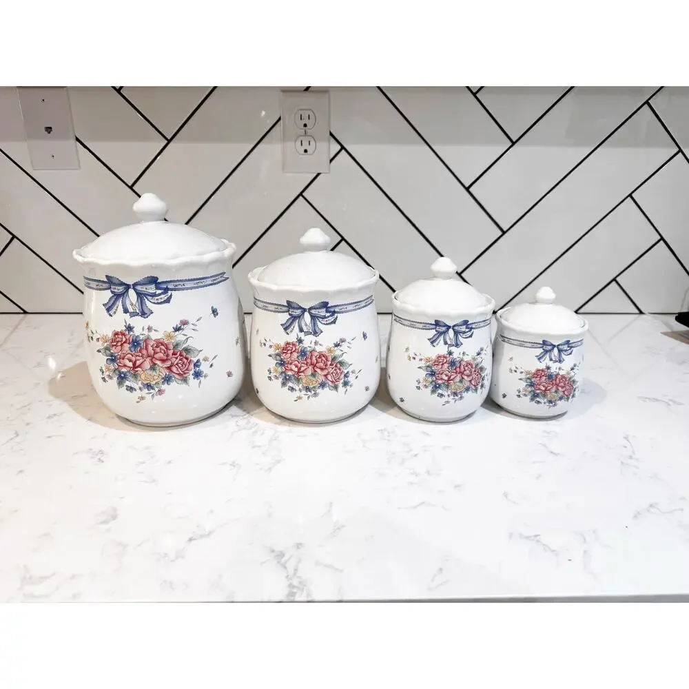 four ceramic kitchen canisters floral bouquet blue ribbon bow 90s cotton prairie